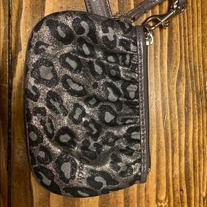 New leopard COACH wallet with wrist strap.